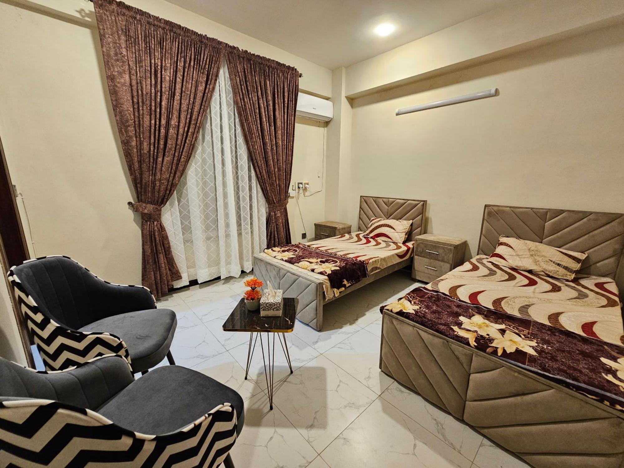 Motorway Majesty Suites Islamabad - Near Islamabad International Airport And Motorway Habitación foto